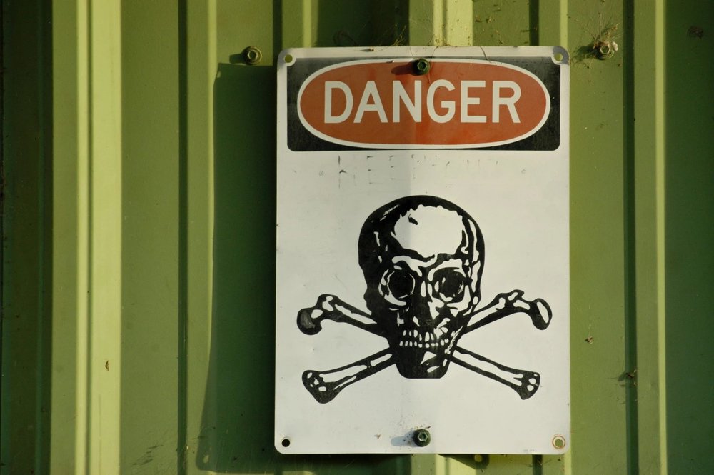 Danger sign with a skull and crossbones